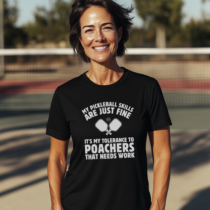 female in a black pickleball tee