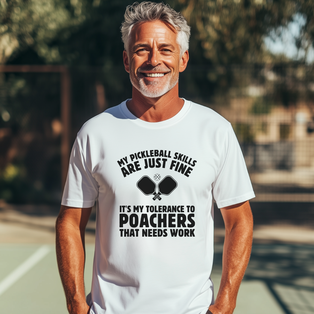 male in a black pickleball tee