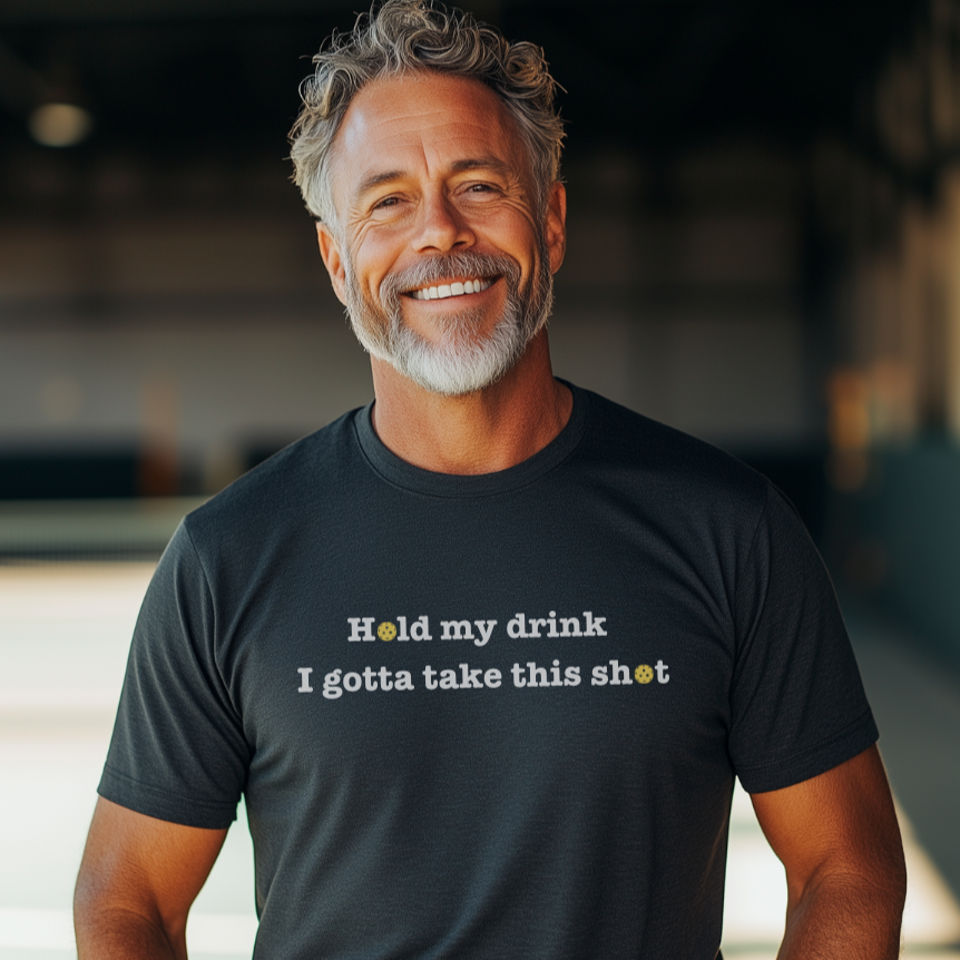 man wearing a dark grey pickleball tee