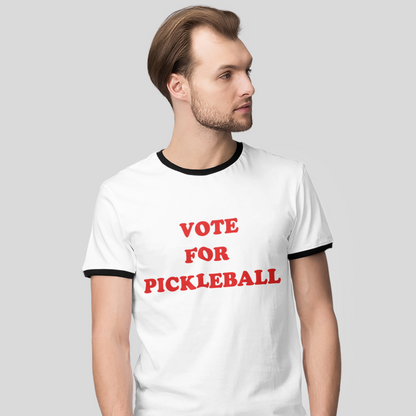 man wearing a white pickleball t-shirt