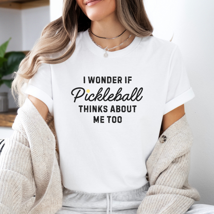 woman wearing a white I wonder if pickleball tee